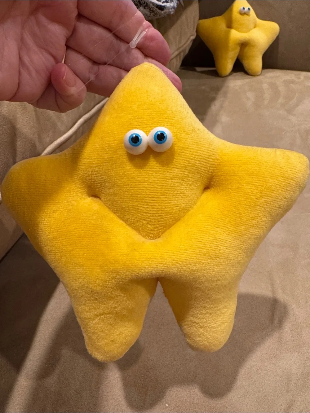 Plush Yellow Star Accent Pillow with Playful Blue Eyes —Funny friends. Two stars